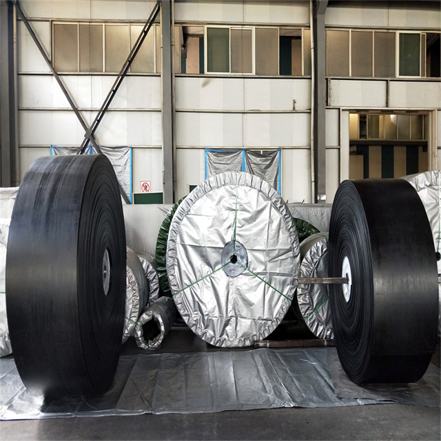 Piezas de la máquina transportadora de correa Cinta transportadora de caucho Ep/Nn de mina estándar